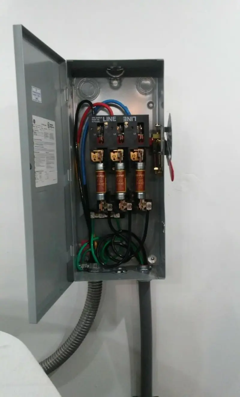Three-phase disconnect switch installed for Smoke Detector Installation in Gray